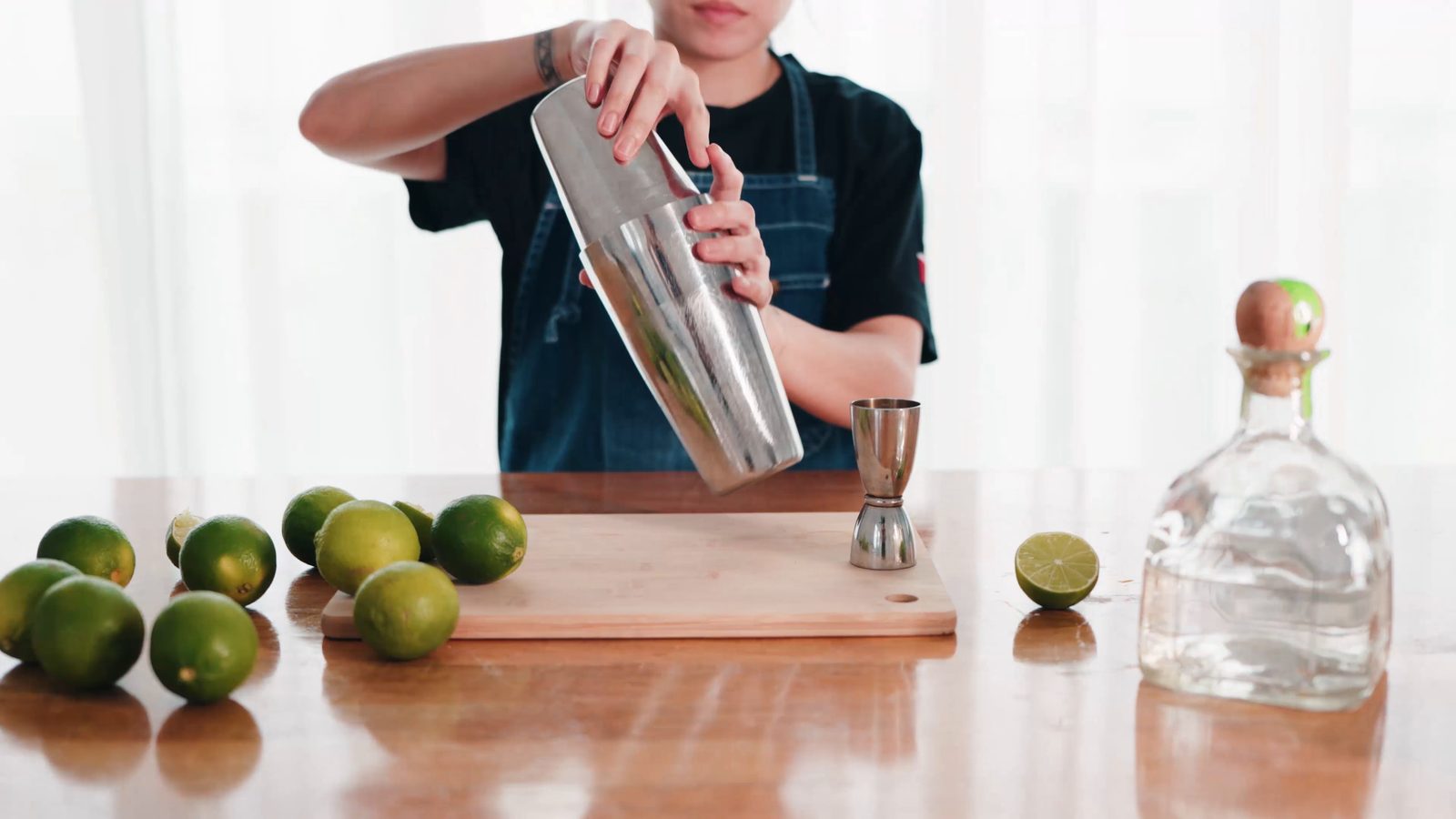 Bartender shaking a cocktail
