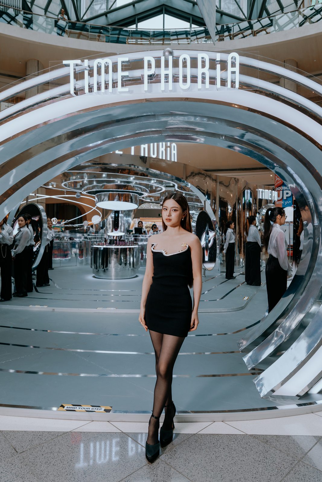 Model under the Time Phoria arch