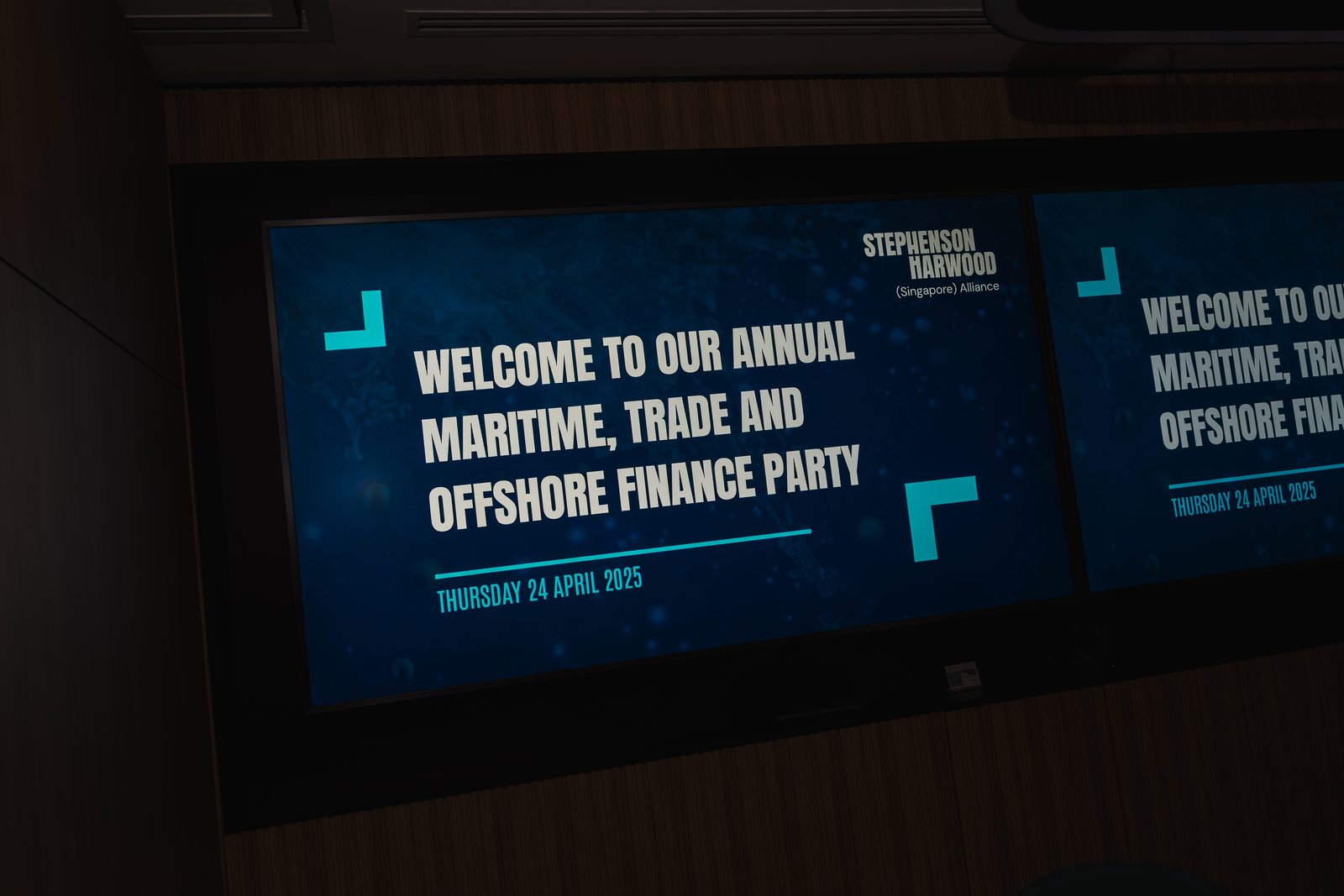 Welcome screens at a corporate event