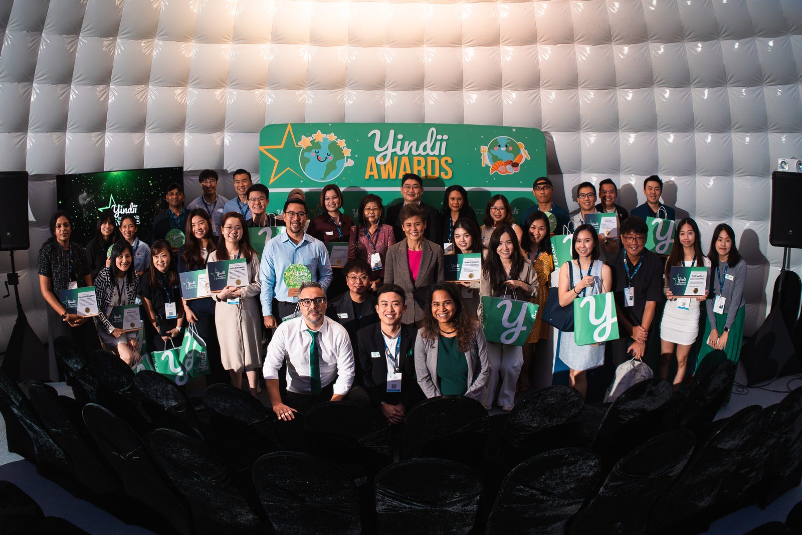 Full audience group photo inside an awards dome
